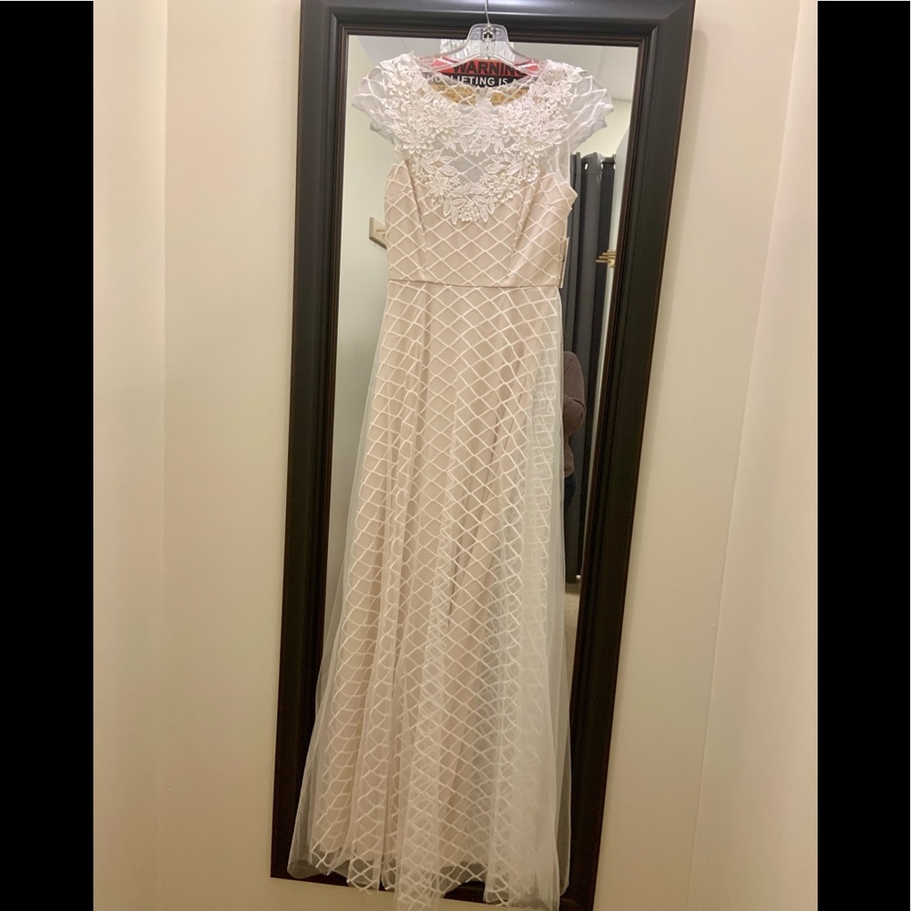 Ivory cap sleeve gown